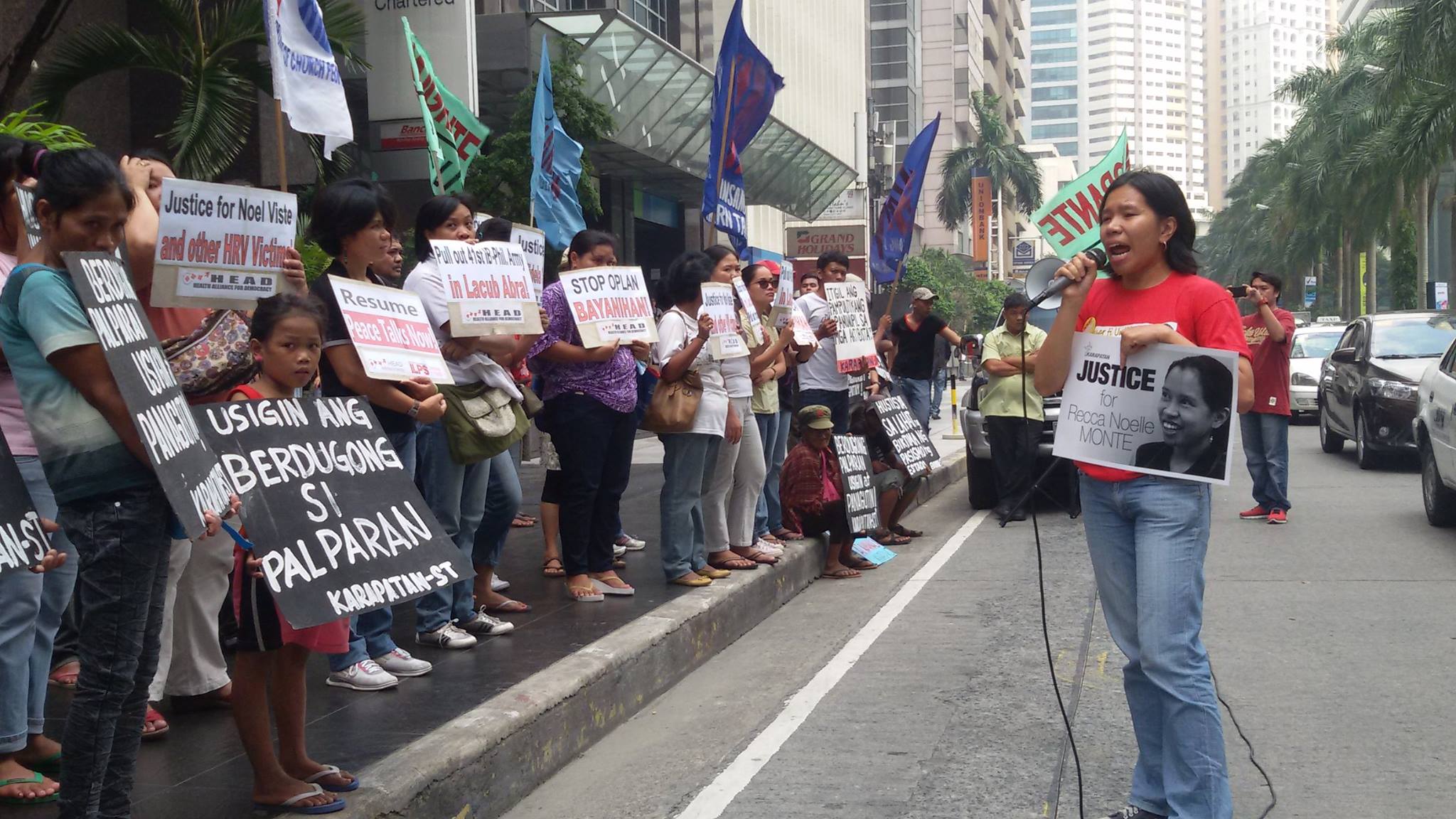 Rights group Karapatan calls on the government to resume the peace talks with the National Democratic Front (NDF) as they protest in front of the Office of the Presidential Adviser on the Peace Process (OPAPP) in Ortigas. Photo courtesy: www.karapatan.org